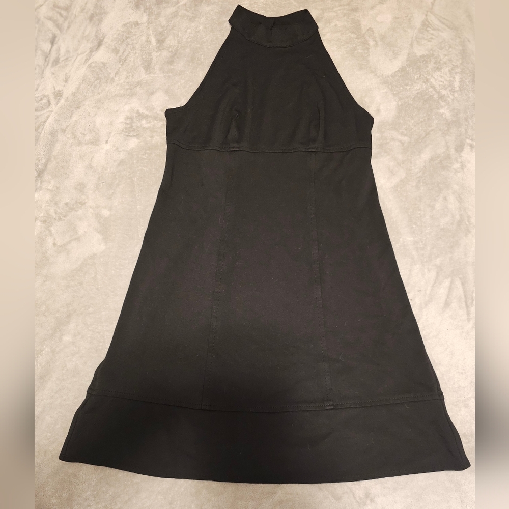 Black mini dress featuring a halter neckline and an A-line silhouette Large